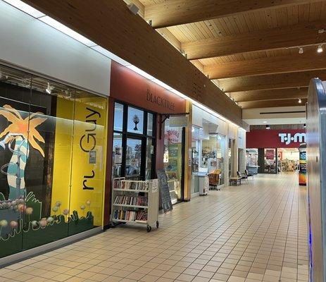 Storefront view from inside the mall