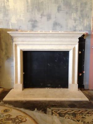 Hand carved limestone fireplace mantle