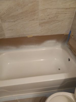 Turned our ugly green bathtub into a brilliant brite white!