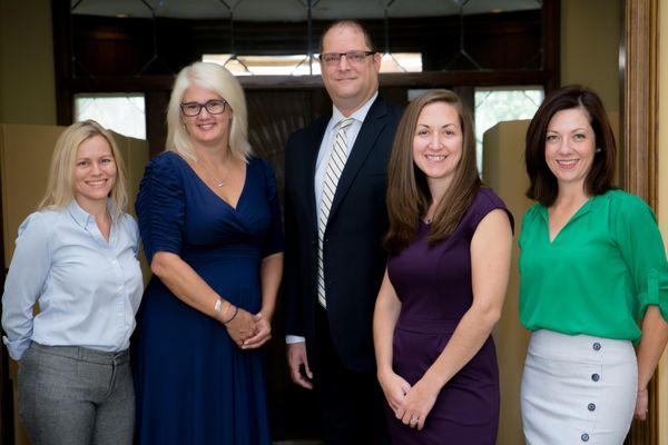 From Left to Right: Caleigh Evans, Elise Whitley, Jon Kurtz, Susan Simos, Monica Guy. At our original office location.