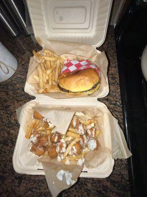 Cheeseburger with ketchup and chicken bites with garlic Parmesan and Cajun rub