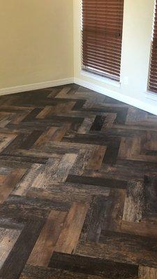 Floating Vinyl Wood plank in herringbone