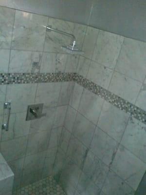 Tiled shower walls.