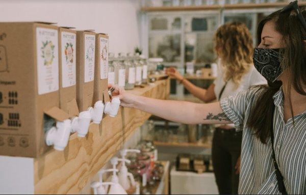 Friends stopping in to refill their personal care and cleaning products