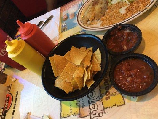 Chips with 4 different salsas. Bunch eaten already!