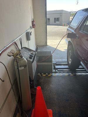 Evap Machine connected to the car tank for inspection