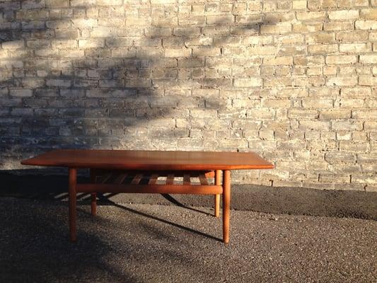 Solid teak coffee table designed by Grete Jalk.