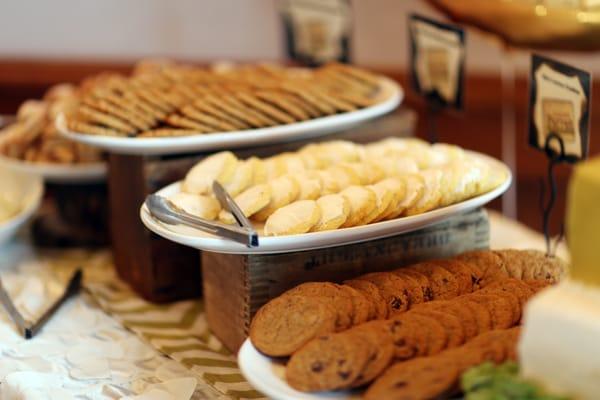 Mini cookies and cinnamon rolls for dessert table