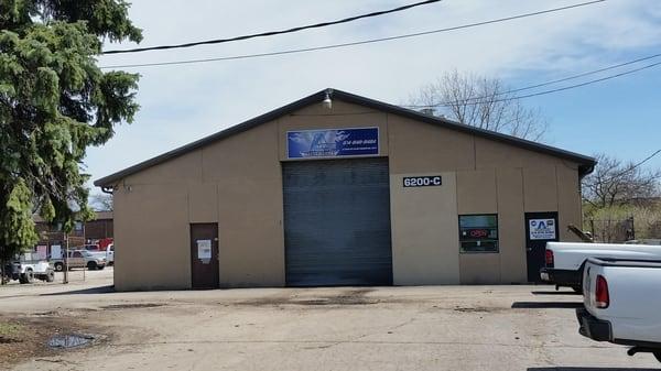 A Team Huntley Rd.  Front view from road. The building sets back from the road.