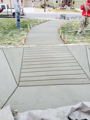 ADA ramp and sidewalk for the No Name park playground in Frederick, CO