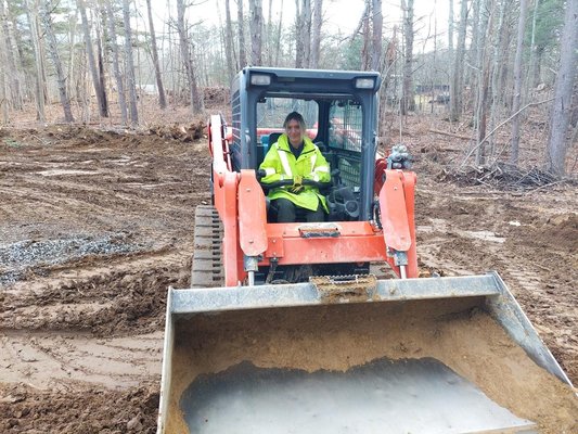 Daughter home from College helping backfill a Foundation  !
We specialize in:   
* Foundation Excavation, Stumping &  Site Work