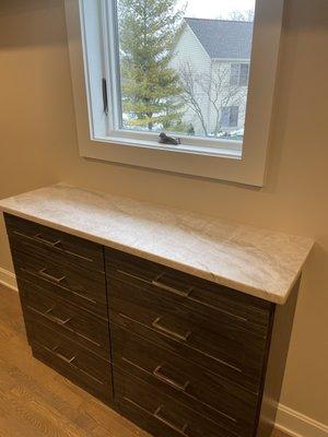 Taj Mahal quartzite, leather finish in closet