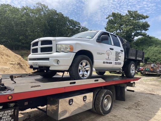 Towing dump truck Towed by Owner of H&H Towing Service on Long Island New York HARRY 6317741843