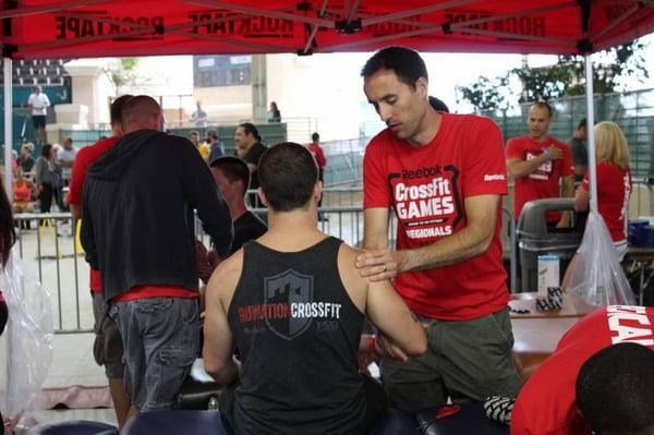 Dr. Kevin Rose treating crossfitters at the CrossFit national qualifier in summer 2013.