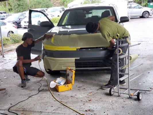 Front bumper on 2019 Volkswagen being repaired