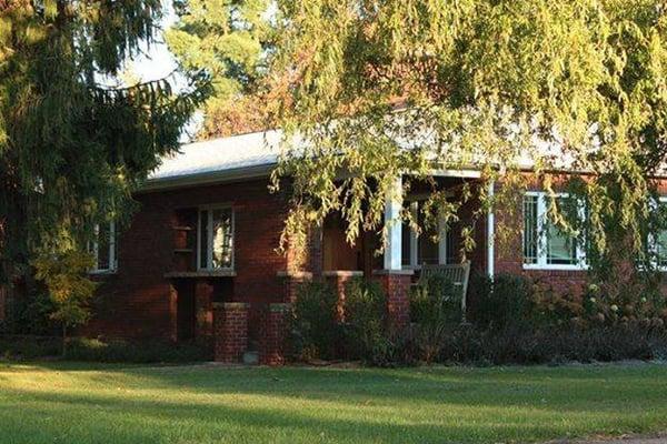 Fernwalk Guest Cottage; the front porch... a second porch that is also good for enjoying your morning coffee. :)