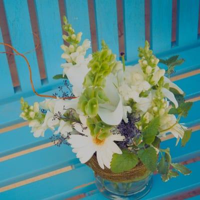 Sweet and simple with a custom appeal snap dragons, gerbera daisies, mint and purple status