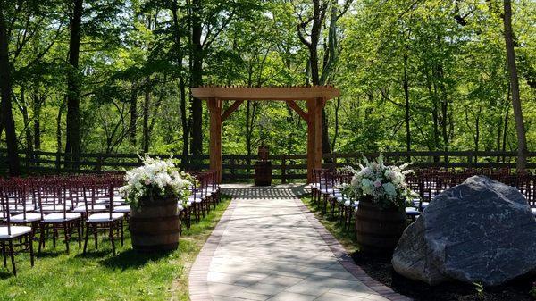 Outdoor rustic ceremony area.