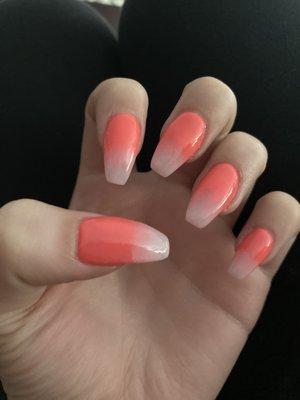 A botched ombré, she wanted different colors to make a smoother transition. Nail tech would only let her do pink and white.