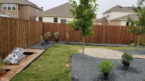 We are putting in a vegetable garden on the left. They put the gravel around out garden forms.