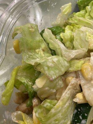 Chopped salad, with cucumbers, almonds, corn, and chicken