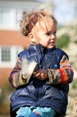 Child carding wool