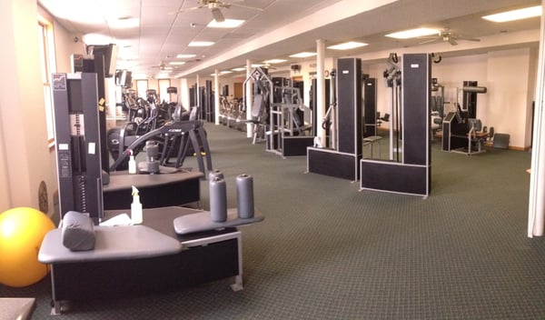 Full fitness center with a variety of workout equipment