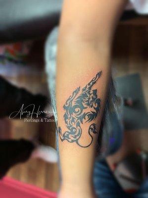 Tribal lion by Aaron