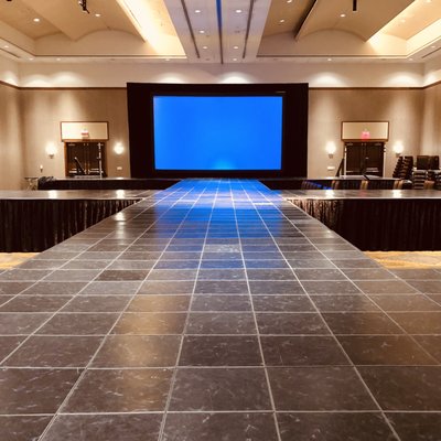 Custom runway stage with vinyl dance floor top