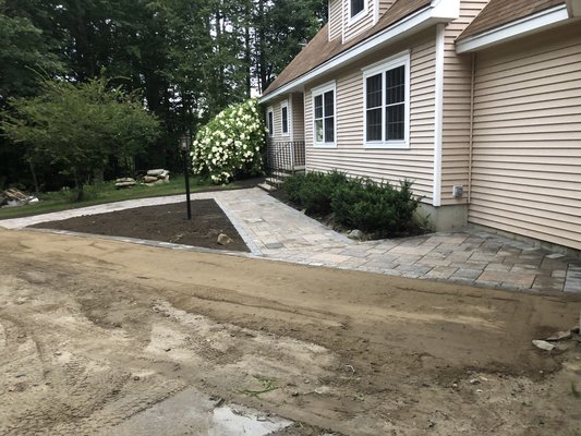 A few pavers cleaned the front yard.