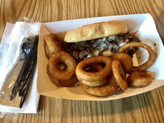 Philly cheesesteak & onion rings. Yum!