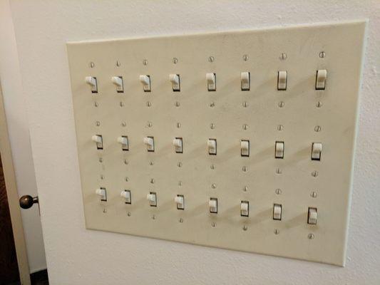 I'm pretty sure this insane light switch panel was my husband's favorite part of the museum . I loved the wagons.