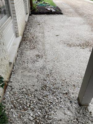 Allrite removed a large, rock filled flower bed and expanded the driveway