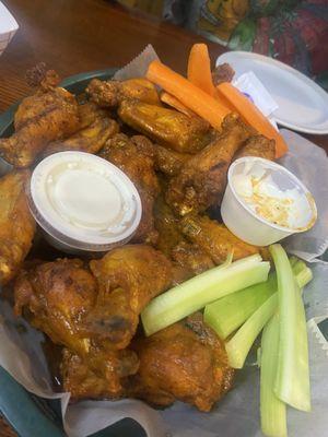 Wings, blue cheese, carrots and celery