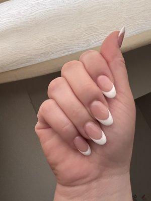 Almond shaped nails with ombré and gel white tip