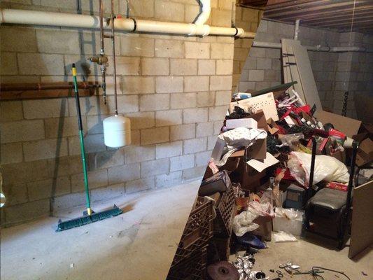 before/after of basement cleanout in garfield nj