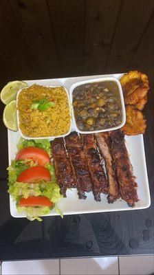 Cuban rice & Beans , Sweet Fried plantains, bbq ribs and salad