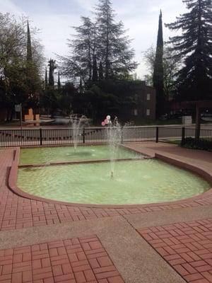 Fountains in front.