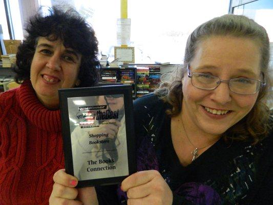 Charlotte and Misty show off one of our 2 Vote 4 the Best Click on Detroit's Best Bookstore awards!