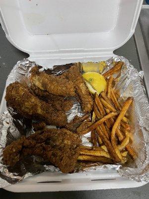 Cajun sampler- Catfish and fries, 2 pieces of shrimp already eaten.