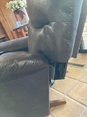 Back of recliner is clearly not attached