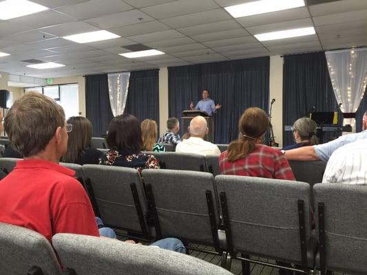 Pastor Erik preaching the gracious good news.