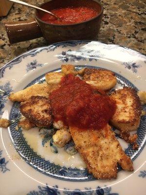 Fried paneer with marinara sauce.