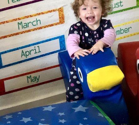 My happy daughter playing in the classroom