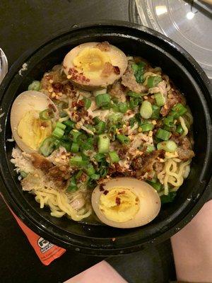 Chicken ramen (topped with cracklin, green onions, and red pepper flakes) with extra soy-mirin egg