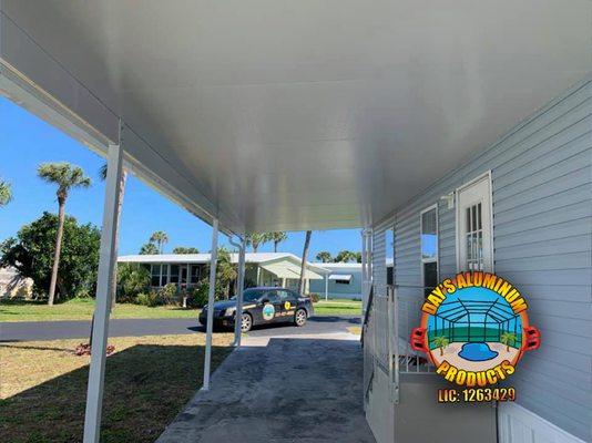 Carport Installation 
 
 Brand new carport completed in Melbourne Beach for some wonderful people at Melbourne Beach Mobile Park. (back)