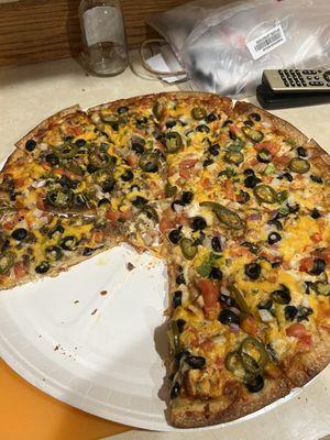 Taco pizza. Half chicken, half beef.