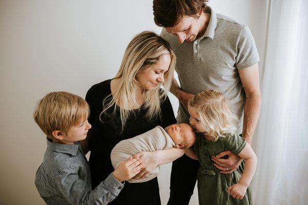 I love to photograph the connections between family members during newborn sessions.