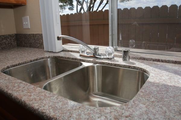 Upgraded granite counter top and stainless steel sinks