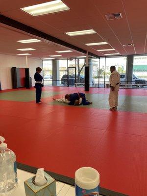 Teenager judo practice. Professional coac Sensei Tamayo.